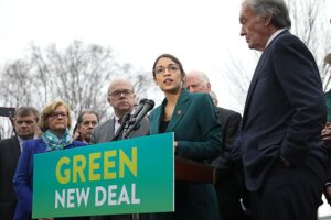 The Green New Deal: A picture of Representative Alexandria Occasio-Cortez and Senator Ed Markey at a rally