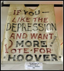 Economic value: Image shows a "sandwich" board supporters of Franklin Roosevelt wore to oppose the reelection of President Hoover.