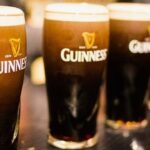 Economic value: Image of pints of Guinness settling