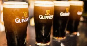 Economic value: Image of pints of Guinness settling