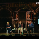Saving capitalism: An image of Gillian Tett, Ann McElvoy, and Yanis Varoufakis on stage for a discussion about fixing capitalism