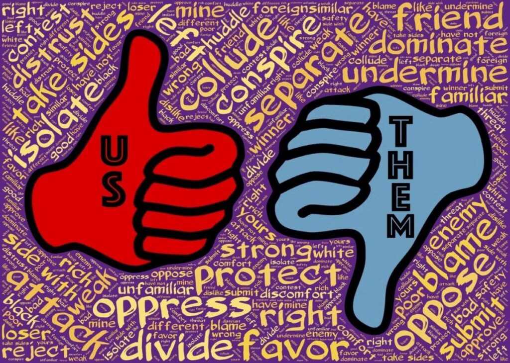 Angrynomics: Image of a red thumbs up (us) and blue thumbs down (them)