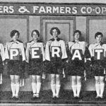 Workers cooperatives: Picture of 11 women holding letters that spell out "cooperation"
