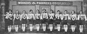 Workers cooperatives: Picture of 11 women holding letters that spell out "cooperation"