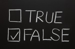 Economic ideas: An image of True and False written on a blackboard with False selected